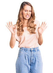 Wall Mural - Young beautiful caucasian woman with blond hair wearing casual clothes disgusted expression, displeased and fearful doing disgust face because aversion reaction.