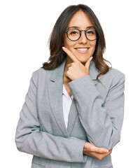 Wall Mural - Young brunette woman wearing business clothes looking confident at the camera smiling with crossed arms and hand raised on chin. thinking positive.