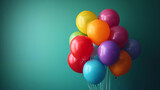 Fototapeta Tęcza - A bunch of multicolored balloons with helium on a green background. balloons for birthday, party, wedding or promotion banners or posters.
