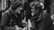 photo portrait of a passer-by man gives food and money to homeless man with old clothes and messy dirty grey hair. sitting and begging money 'n food on a american street. cold rainy day.