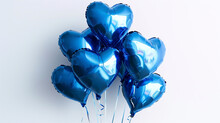 Blue balloons in shape of heart on white background. Blue heart shaped helium balloons on white background. Air balloons. Minimal love concept. Valentine's Day or wedding party decoration. 