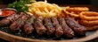 Cevapcici served with fries and onion rings.