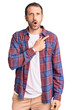 © Krakenimages.com - Young handsome man wearing casual clothes surprised pointing with finger to the side, open mouth amazed expression.