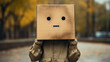 Depressed man with box over head