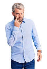 Sticker - Young handsome blond man wearing elegant shirt pointing to the eye watching you gesture, suspicious expression