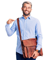 Sticker - Young handsome blond man wearing elegant shirt holding briefcase pointing finger to one self smiling happy and proud