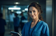 © LunaKate - Young female doctor on modern clinic background.