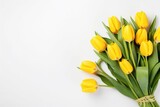 Fototapeta Tulipany - bouquet of beautiful yellow tulips on white background, flat lay and copy space - generative ai