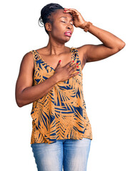 Canvas Print - Young african american woman wearing casual clothes touching forehead for illness and fever, flu and cold, virus sick