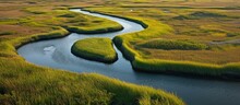 Meandering Channels Flow Through A Salt Marsh In Pleasant Bay, Cape Cod, Massachusetts. Marshes Are Wetlands That Provide Habitats For Fish, Invertebrates, And Various Bird Species.