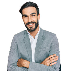 Poster - Young hispanic man wearing business clothes happy face smiling with crossed arms looking at the camera. positive person.