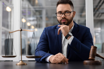 Sticker - Portrait of handsome lawyer at table in office