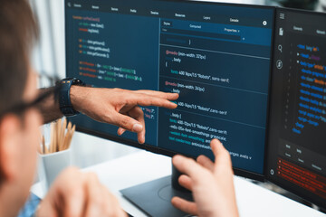 it developers creating online software development information on screen laptop with coding program 