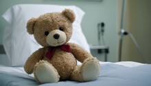 Banner With A Teddy Bear Toy On A Patient's Bed In A Hospital. Children's Medical Center. Healthcare And Childhood Concept