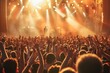 © CStock - A massive crowd cheering around a concert stage.