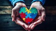 © KerXing - Hands holding a heart-shaped puzzle piece, symbolizing the importance of understanding and acceptance in mental health