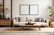 © Johan Wahyudi - Square coffee table near white sofa and rustic cabinets against white wall with two blank poster frames with copy space. Japanese home interior design of modern living room
