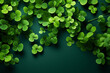 A minimalist design featuring a field of four-leaf clovers against a green background.