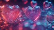  a couple of glass hearts sitting next to each other on top of a blue and pink surface with bubbles around them.