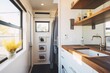 © OMD - interior shot of a bathroom in a sleek tiny home