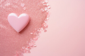 Wall Mural - Pink heart on pink glitter background. Valentines day love concept.