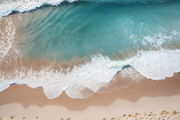  Beautiful sandy beach and soft blue ocean wave, top-down view