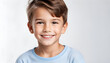 © anmitsu - White background photo of professional portrait of cute blond Caucasian boy child model smiling with perfect clean teeth. For advertising, web design, etc.
