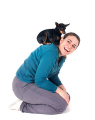 Poster - miniature pinscher and woman in studio