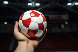 The hand is holding the handball ball. Generative AI Image.
