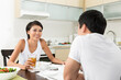 © Image Smith - Happy Asian couple eating at home
