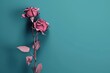  a single pink rose sitting on top of a green table next to a leafy plant on a blue background.