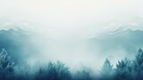 Fototapeta Las -  a blurry photo of a forest with mountains in the background and a foggy sky in the foreground.