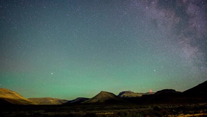 Poster - time lapse of stars and milky way over karoo landscape with a transmission tower with red lights in 