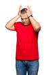 © Krakenimages.com - Middle age arab man over isolated background suffering from headache desperate and stressed because pain and migraine. Hands on head.