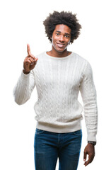 Canvas Print - Afro american man over isolated background showing and pointing up with finger number one while smiling confident and happy.