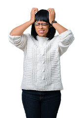 Sticker - Beautiful young african american woman wearing glasses over isolated background suffering from headache desperate and stressed because pain and migraine. Hands on head.