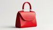 © Fotograf - A red purse is pictured on a clean white background. Perfect for fashion or accessory related projects