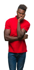 Wall Mural - Young african american man over isolated background thinking looking tired and bored with depression problems with crossed arms.