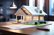 Real estate agency dummy small living house on a table with contract document and blurry background