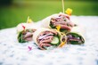 multiple gyro sandwiches wrapped for a picnic