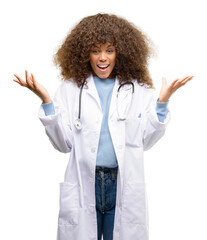 Sticker - African american doctor woman, medical professional working happy and surprised cheering expressing wow gesture