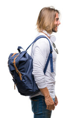 Canvas Print - Young handsome tourist man with long hair wearing backpack over isolated background looking to side, relax profile pose with natural face with confident smile.