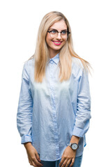 Poster - Young beautiful blonde business woman wearing glasses over isolated background looking away to side with smile on face, natural expression. Laughing confident.