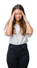 Sticker - Young beautiful brunette business woman over isolated background with hand on head for pain in head because stress. Suffering migraine.