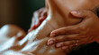 A spa massage and facial and neck treatment for relaxation and tranquility. Close-up kinesitherapy session for attractive middle-aged female patients