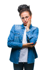 Wall Mural - Young braided hair african american girl wearing glasses over isolated background thinking looking tired and bored with depression problems with crossed arms.