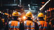 © alexkich - workers helmets at the factory, view from the back, group of workers, change of workers in the factory