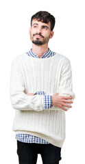 Wall Mural - Young handsome man wearing winter sweater over isolated background smiling looking side and staring away thinking.