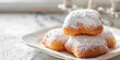Sugared Beignets on Festive Morning. Warm beignets dusted with sugar, cozy holiday dessert on kitchen background with copy space.