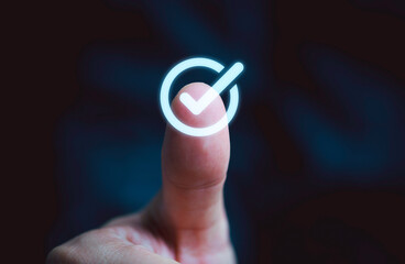 Fototapete - Closeup of hand thumb up with virtual correct sign or tick mark for approve quality assurance and guarantee concept.